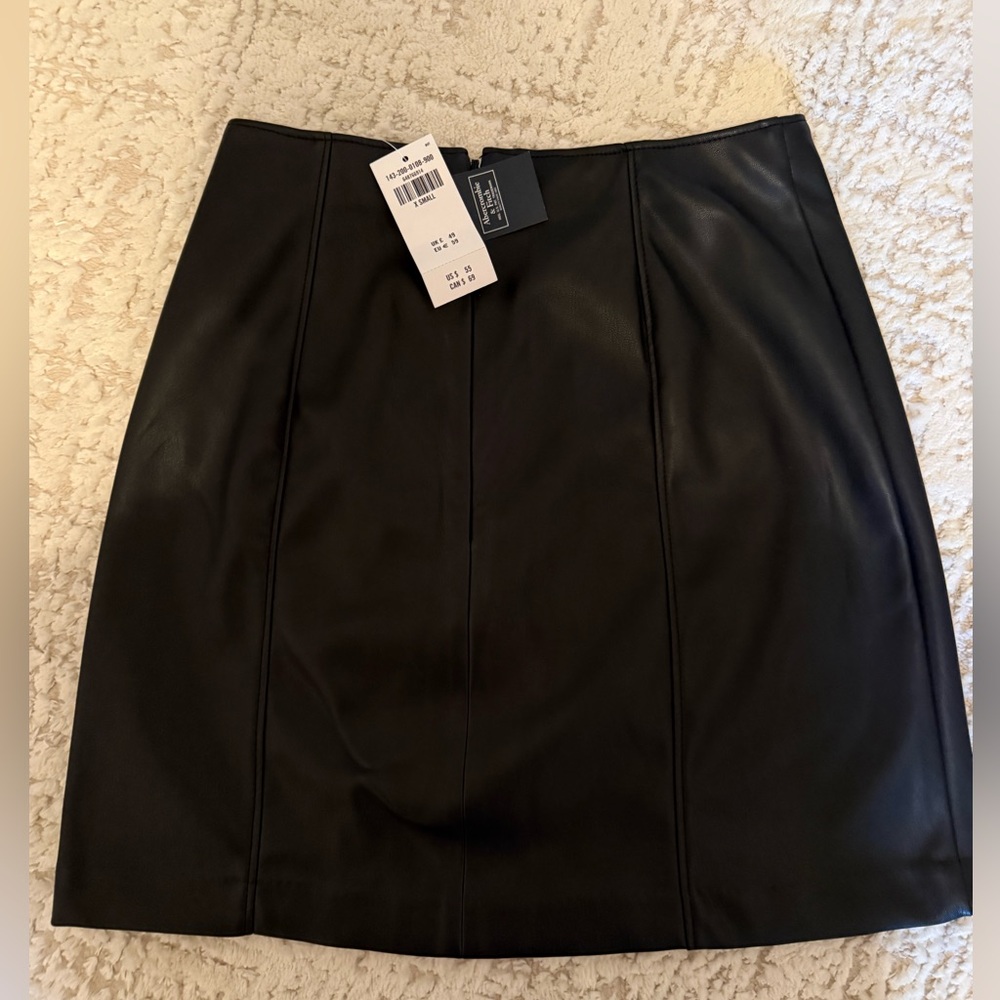 Faux leather black mini skirt